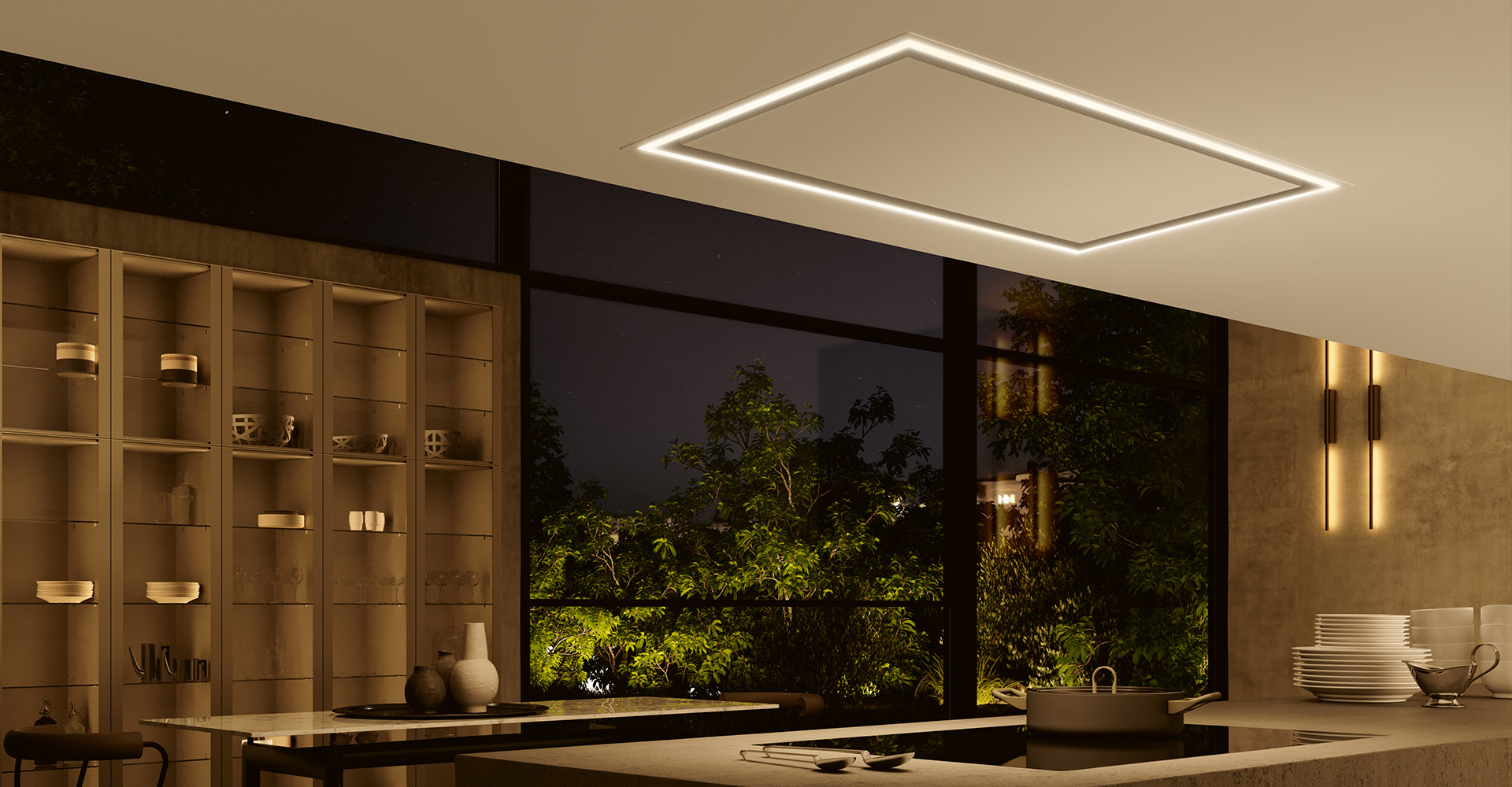 Hotte plafonnier WESCO Volano avec bandeau lumineux LED dimmable dans une cuisine ouverte moderne, de nuit.